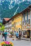 Tourists walking through the town of Mittenwald in Bavaria, Germany