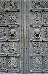 Ancient medieval metal door of Bremen Cathedral, Germany.