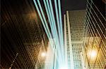 Fiber optic light trail communication technology streaming through highrise buildings, concept