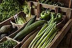 Still life fresh, organic, healthy, green vegetable harvest variety in wood crate