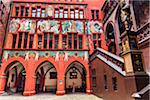 Archways with frescoes and ornate staircase at the Basel Town Hall (Rathaus), Basel, Switzerland