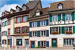 Traditonal houses with shutters on street in historic city of Basel, Switzerland
