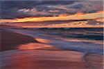 Sunset and surf on the Pacific Ocean at Sunset Beach on Oahu, Hawaii, USA