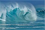 Big dramatic wave on a sunny day in the Pacific Ocean at Oahu, Hawaii, USA