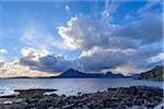 Scottish coast with dramatic clouds over Loch Scavaig on the Isle of Skye in Scotland, United Kingdom