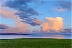 Cumulonimbus clouds at sunset over the ocean at the Isle of Sky in Scotland, Isle of Skye, Scotland, United Kingdom