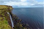 Mealt Waterfall with Kilt Rock on the Trotternish Peninsula on the Isle of Skye in Scotland, United Kingdom