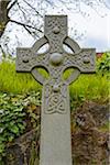 Celtic cross in the Old Town Cemetery on a cloudy day in Stirling, Scotland, United Kingdom