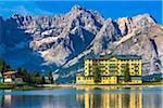 Grand Hotel Misurina and mountains reflected in Lake Misurina in the Dolomites near Cortina d'Ampezzo, Italy