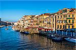 Overview of the historical buildings along the Grand Canal on a sunny morning in Venice, Italy