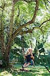 Mother and daughter on swing