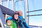 Father and son in cable car, Hintertux, Tirol, Austria