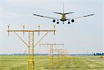 Airplane landing by runway landing lights, Schiphol, North Holland, Netherlands, Europe