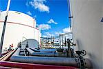 Storage tanks and industrial piping at biofuel plant