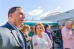 Manger and workers meeting outside biofuel industrial plant