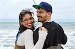 Portrait of young couple sea fishing