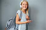 Smiling girl wearing headphones