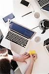 Woman doing notes in office