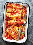 close up of rustic italian spinach ricotta cannelloni pasta