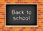 Blackboard with text message back to school on old red brick background texture. School education object