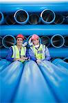 Workers talking in factory