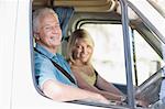 Older couple driving RV