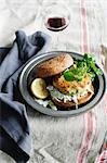 Trout tzatziki burger on plate