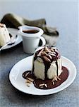 Ice cream with chocolate sauce and nuts