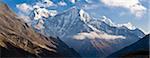 Snowy mountaintop and blue sky