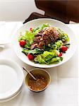 Plate of beef salad with sauce