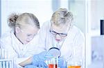 Children playing scientists in lab