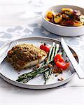 Fish with romesco crust and asparagus