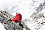 Mid adult woman mountain climbing, Chamonix, France