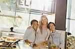 Portrait smiling young women enjoying salad bar at grocery store market