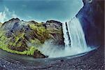 famous Skogarfoss waterfall in southern Iceland. treking in Iceland. Travel and landscape photography concept