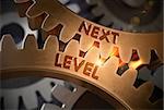Next Level - Illustration with Glow Effect and Lens Flare. Next Level Golden Metallic Cog Gears. 3D Rendering.