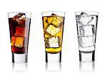 Glasses of energy drink cola and  sparkling water with ice cubes and bubbles white background with reflection