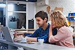 attractive couple drinking coffee in the cafe