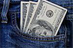 American dollar banknotes in jeans pocket