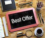 Top View of Office Desk with Stationery and Red Small Chalkboard with Business Concept - Best Offer. Best Offer on Small Chalkboard. 3d Rendering.