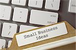 Small Business Ideas. File Card Concept on Background of Modern Keyboard. Archive Concept. Closeup View. Blurred Toned Image. 3D Rendering.