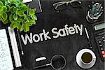 Work Safety. Business Concept Handwritten on Black Chalkboard. Top View Composition with Chalkboard and Office Supplies. 3d Rendering. Toned Image.