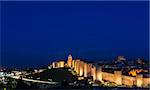 Panoramic view of the historic city of Avila,at the blue hour, in Spain. the old city of Avila and its extramural churches were declared a World Heritage site by UNESCO
