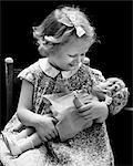1930s 1940s SMILING BLOND GIRL HOLDING BABY DOLL