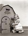 1940s LITTLE GIRL PLAYING DOLL DOLLHOUSE