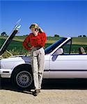 1990s WOMAN WITH CAR TROUBLE ON CELLULAR PHONE CALLING FOR ROADSIDE ASSISTANCE