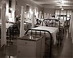 1950s 1960s CROWDED HOSPITAL WARD BEDS NURSES DOCTORS PATIENTS