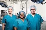 Surgeons in operating theatre