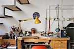 Jewellery making equipment and tools on jewellery workshop workbench