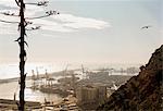 Elevated view of port ships and cranes, Barcelona, Spain